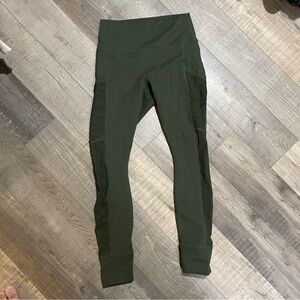 Green athletic leggings